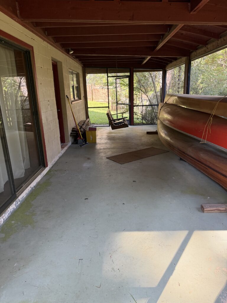 Screened porch with cleared floor space after refrigerator removal in Hiawassee, Georgia, by Appalachian Junk Removal, LLC.